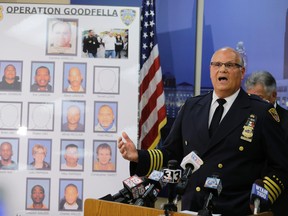 Cleveland Police Deputy Chief Ed Tomba answers questions about the arrest of Carmine Agnello at a news conference Wednesday, July 15, 2015, in Cleveland. Authorities say Agnello, a reputed member of New York’s Gambino crime family, has been arrested in Cleveland after an 18-month investigation uncovered a $3 million scam involving stolen cars and scrap metal. (AP Photo/Tony Dejak)