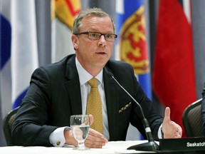 Saskatchewan's Premier Brad Wall speaks during a news conference after the Quebec Summit On Climate Changes at the Hilton hotel in Quebec City, in this April 14, 2015 file photo. (REUTERS/Mathieu Belanger)