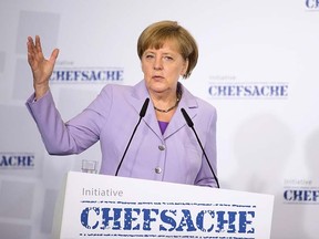 German Chancellor Angela Merkel speaks during a meeting on the role of women in leadership in Berlin, Germany, July 13, 2015. REUTERS/Axel Schmidt