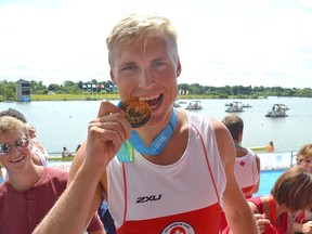 Thedford's Tim Schrijver is shown with the gold medal he won as a member of the Canadian men's eights rowing team at the Pan Am Games in this photo provided by Cathy Johnson, who taught Schrijver at North Lambton Secondary School in Forest. It was the rower's second gold medal at the Toronto games. Handout/Sarnia Observer/Postmedia Network