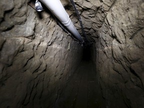 A tunnel connected to a Mexican prison and used by drug lord Joaquin 'El Chapo' Guzman to escape is seen in Almoloya de Juarez, on the outskirts of Mexico City, July 15, 2015. (REUTERS/Edgard Garrido)
