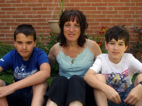 Mary Rodrigues, with her sons Max Fleming, 11, left,  and Ethan Fleming, 10. Rodrigues was recently elected president of the London chapter of MADD Canada. HEATHER RIVERS/WOODSTOCK SENTINEL-REVIEW