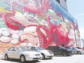 This mural on the west exterior wall of 199 Dundas St., titled Octopus? Garden 2, is the first stop Saturday on a series of seven Museum London guided walking tours to visit murals throughout the city?s core every Saturday until Aug. 29. (JOE BELANGER, The London Free Press)
