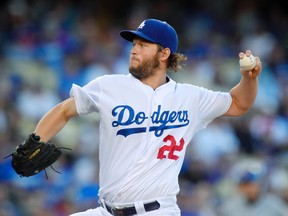 Los Angeles Dodgers pitcher Clayton Kershaw throws during MLB play against the New York Mets Friday, July 3, 2015, in Los Angeles. (AP Photo/Mark J. Terrill)