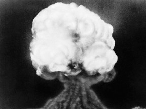 This July 16, 1945 photo, shows the mushroom cloud of the first atomic explosion at Trinity Test Site, New Mexico.  Thursday, July 16, 2015 marks the 70th anniversary of the Trinity Test in southern New Mexico comes amid renewed interest in the Manhattan Project thanks to new books, online video testimonies and the WGN America drama series “Manhattan.(AP Photo, File)
