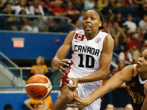 Canada’s Nirra Fields gets fouled under the basket while playing against Venezuela during women’s Pan Am basketball at the Mattamy Centre last night. (Stan Behal/Toronto Sun)