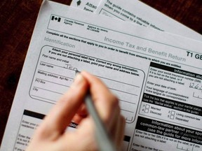 A T1 General 2010 tax form is pictured in Toronto on April 13, 2011. (THE CANADIAN PRESS/Chris Young)