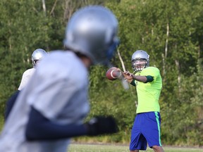 Members of the Sudbury Spartans run through drills during team practice in Sudbury, Ont. on Thursday July 16, 2015.