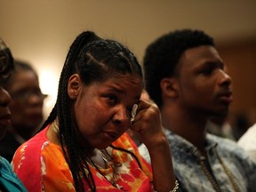 Eric Garner's widow, Esaw Garner, attends an interfaith prayer service at Mount Sinai United Christian Church to mark the one-year anniversary of the death of Eric Garner on July 14, 2015 in New York City. Garner was killed in a controversial chokehold by a Staten Island police officer one year ago on July 17. Spencer Platt/Getty Images/AFP