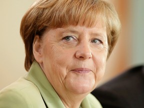 German Chancellor Angela Merkel attends the weekly cabinet meeting at the Chancellery in Berlin, Germany, Wednesday, July 15, 2015. AP Photo/Michael Sohn