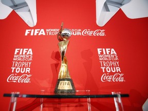 The FIFA 2015 Women's World Cup Trophy is unveiled in Ottawa, Canada. (AFP/COLE BURSTON)