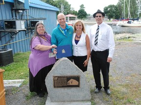 JESSICA LAWS/FOR THE INTELLIGENCER
Janna Munkittrick-Colton, chairwoman of Heritage Belleville; Coun. Mitch Panciuk and Jill Raycroft, member of Heritage Belleville and Stanley Jones, past chairman of Heritage Belleville unveiled a monument dedicated to the Wharf Street Debating Club on Friday.