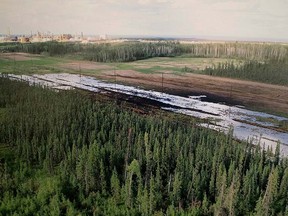A Nexen-supplied image of a pipeline oil spill near the Long Lake oil sands operation is shown at a press conference in Calgary, Friday, July 17, 2015.THE CANADIAN PRESS/Larry MacDougal