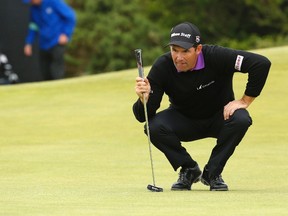 Ireland’s Padraig Harrington lines up a putt on the 5th green during the second round of the British Open Golf Championship at the Old Course, St. Andrews, Scotland, Friday, July 17, 2015. (Jon Super/AP Photo)