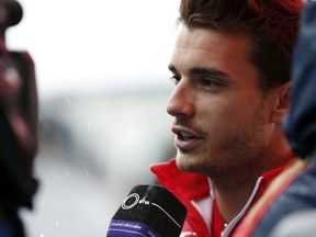 Marussia Formula One driver Jules Bianchi of France speaks to the media after a news conference at the Suzuka circuit in this October 2, 2014 file photo. (REUTERS/Yuya Shino/Files)