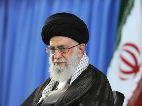 In this picture released by the official website of the office of the Iranian supreme leader on Saturday, July 11, 2015, Supreme Leader Ayatollah Ali Khamenei attends a meeting with university students in Tehran, Iran. Iran's state-run Press TV cited Khamenei as calling the U.S. an "excellent example of arrogance." It said Khamenei told university students in Tehran to be "prepared to continue the struggle against arrogant powers." (Office of the Iranian Supreme Leader via AP)