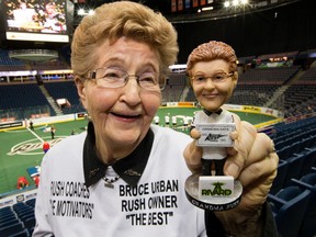 Everybody loves grandma! Joyce "Grandma Rush" Souka poses for a photo with her bobblehead prior to the Edmonton Rush and Toronto Rock NLL game at Rexall Place, in Edmonton Alta., on Friday Feb. 27, 2015. Proceeds from the sale of the bobbleheads will go to the charity Angels Anonymous. David Bloom/Edmonton Sun/QMI Agency