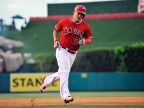 Angels centre fielder Mike Trout rounds the bases after hitting a solo home run against the Yankees at Angel Stadium in Anaheim on July 1, 2015. Angels officials are unlikely to submit a proposal to use Angels Stadium to host a relocated NFL team. (Gary A. Vasquez/USA TODAY Sports)
