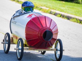 Dominic Bryans zips down the track in a Home Hardware soapbox racer on Saturday July 18, 2015 in Bloomfield, Ont. The annual Soapbox Derby has been a County fixture for the last 20 years. Tim Miller/Belleville Intelligencer/Postmedia Network