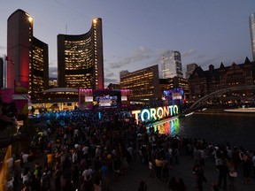 A general view of crowds gathered in Nathan Phillips Square during the opening ceremony for the 2015 Pan Am Games on July 10, 2015. (Eric Bolte-USA TODAY Sports via Reuters)