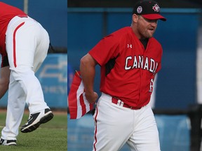 Stubby Clapp removes a Puerto Rican flag that a team member placed on the field before a Pan Am semifinal game between Canada and Puerto Rico in Ajax on July 18, 2015. (Veronica Henri/Toronto Sun/Postmedia Network)