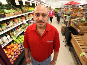 Munther Zeid, owner and operator of Food Fare, says the weakening dollar is leading to higher prices for food that may have to be passed on to consumers. (Kevin King/Winnipeg Sun)