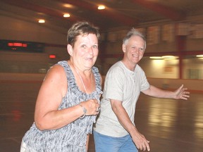 Pat Kelly and her husband quickly and nimbly roller-skated their way around the rink at Clearwater Arena on July 10, during the afternoon session of Roller Skating in Sarnia. The weekend skates are the brainchild of Brad Fisher, who wants to re-establish regular roller-skating in the city. (Carl Hnatyshyn/ Postmedia Network)