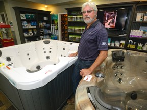 Walter Schmoll of Hollandia Pools has created backyard oases, complete with hot tubs, for many homes in Southwestern Ontario. (MORRIS LAMONT, The London Free Press)