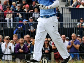 Canada's Graham DeLaet walks from the 17th tee during the third round at the British Open at the Old Course, St. Andrews, Scotland, on Sunday, July 19, 2015. (Peter Morrison/AP Photo)