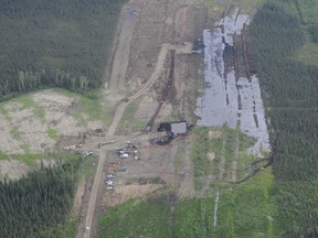 Crews work to clean an oil spill near Nexen's Long Lake facility by Fort McMurray. The spill was discovered by a contractor after the safety system designed to detect ruptures failed. Garrett Barry/Fort McMurray Today/Postmedia Network