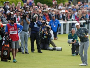 United States’ Jordan Spieth plays a shot on the 18th hole during the third round of the British Open at the Old Course in St. Andrews, Scotland on July 19, 2015. (AP Photo/Alastair Grant)