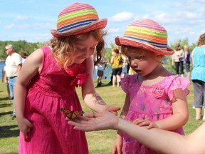 Ryan Byrne/For the Sudbury Star
Abby Golder, 4, and Charlotte Golder, 2, released butterflies yesterday in memory of a loved one during the Maison Vale Hospice KIA Butterflies & Memories fundraiser.