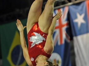 Canada's Rosie MacLennan executes her routine in the Women's Individual Gymnastics Trampoline final to take first place at the 2015 Pan American Games in Toronto, Canada July 19, 2015. (AFP PHOTO/EVA HAMBACH)