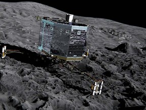 This undated artist's impression by ESA /ATG medialab ,  publicly provided by the European Space Agency,  ESA, shows Rosetta’s lander Philae (front view) on the surface of comet 67P/Churyumov-Gerasimenko.   (ESA/ATG medialab/ESA  via AP)