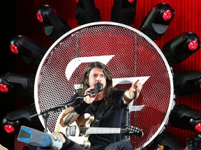 Dave Grohl of the Foo Fighters performs as part of the '20th Anniversary and Broken Leg Tour' on Wednesday, July 15, 2015. (Greg Allen/Invision/AP)