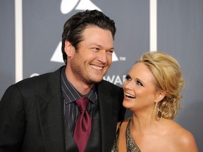 In this Feb. 13, 2011 file photo, Blake Shelton, left, and Miranda Lambert arrive at the 53rd annual Grammy Awards in Los Angeles. Shelton and Lambert announced their divorce after four years of marriage. Shelton’s spokesman provided a statement from the couple on Monday, July 20, 2015. (AP Photo/Chris Pizzello, File)