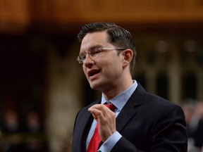 Employment Minister Pierre Poilievre responds to a question during question period in the House of Commons on Parliament Hill in Ottawa on Friday, June 12, 2015. Canada's employment minister was in Halifax Monday to promote what has been billed as the largest one-time benefit payment in federal history. (THE CANADIAN PRESS/Sean Kilpatrick)