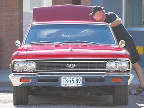 Tim Atkinson puts the final touches on his 1966 Chevelle SS after arriving at the Show and Shine on Saturday. Tim and his wife Arlene drove in from Lethbridge specifically for the event.
