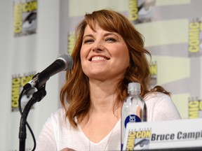 Lucy Lawless, who starred in the '90s series 'Xena,' is seen here speaking during the Ash vs. Evil Dead panel on day 2 of Comic-Con International on Friday, July 10, 2015, in San Diego, Calif. (Tonya Wise/Invision/AP)