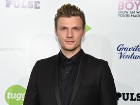 In this Jan. 29, 2015 file photo, Nick Carter arrives at the "Backstreet Boys: Show 'Em What You're Made Of" premiere in Los Angeles. Backstreet Boys Carter, A.J. McLean and Howie Dorough will star in the Syfy channel's "Dead 7," along with Joey Fatone of 'N Sync fame. "Dead 7," which Carter is also producing and co-writing, is scheduled to air in 2016, the Syfy channel said Tuesday, July 14, 2015. (Rob Latour/Invision/AP, File)