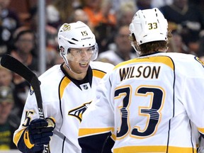 Craig Smith #15 of the Nashville Predators reacts to his goal with Colin Wilson #33 to take a 3-2 lead over the Anaheim Ducks during the third period at Honda Center on January 4, 2015 in Anaheim, California. (Harry How/Getty Images/AFP)
