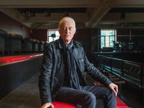 Led Zeppelin guitarist Jimmy Page poses for a photo at the Masonic Temple building in Toronto on Monday July 20, 2015. (Ernest Doroszuk/Toronto Sun)