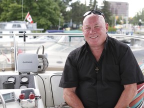 Ottawa's Ken Dale, CEO of SnowTech Solutions, is pictured here on his boat Monday, July 20, 2015.
MATT DAY Ottawa Sun/Postmedia Network