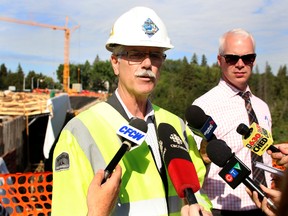 Barry Belcourt, branch manager for roads design and construction, speaks to media on the 102 Avenue Bridge construction project on Monday, July 20, 2015 in Edmonton. (Trevor Robb/Edmonton Sun)
