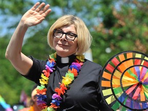 Mark Wanzel/Postmedia Network
Political activist and NDP MPP Cheri DiNovo waves to the crowd during Barrie's Pride Parade.