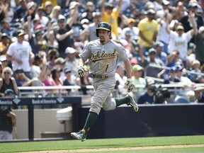Billy Burns — having a great rookie season — is not to be confused with disappointing free-agent pickup Billy Butler or general manager Billy Beane. (DENIS POROY/Getty Images/AFP)