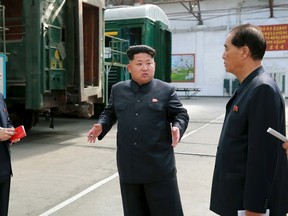 North Korean leader Kim Jong Un provides field guidance to the Kim Jong Thae Electric Locomotive Complex in this undated photo released by North Korea's Korean Central News Agency (KCNA) in Pyongyang on July 20, 2015. REUTERS/KCNA