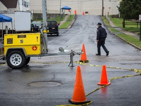 The manhole that two convicted murderers used to escape from Clinton Correctional Facility is seen on June 15, 2015 in Dannemora, New York. The convicts, Richard Matt and David Sweat, escaped June 6 from the Clinton Correctional Facility. Andrew Burton/Getty Images/AFP