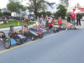 Colourful soap box vehicles participating in the annual derby.