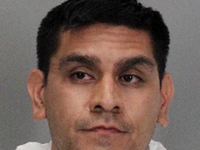 This Sunday, July 19, 2015 booking image released by the Santa Clara County Sheriff's Department shows Martin Martinez. Martinez was arrested on Sunday in San Jose, Calif., for the murders of two women and three children in Modesto, Calif., on Saturday. (Santa Clara Sheriff's Department via AP)